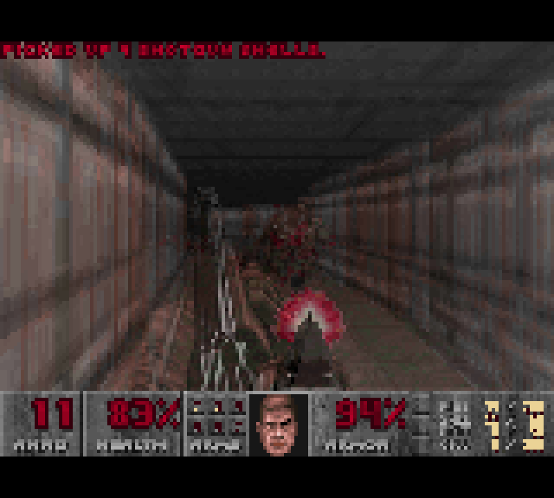 Doom E1M1 on the Chromatic LCD, captured over USB video at 320x288: the hangar with the status bar at the bottom