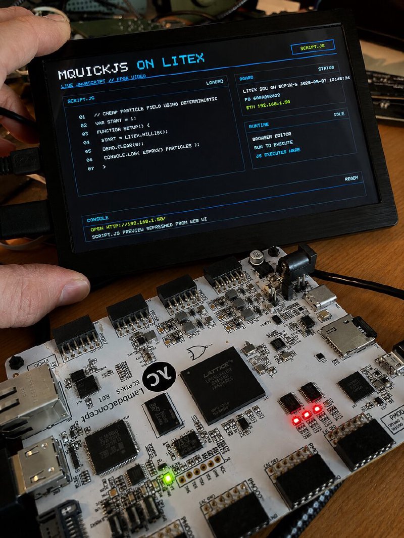 A LambdaConcept ECPIX-5 board running the mquickjs live JavaScript editor, served from the FPGA over Ethernet